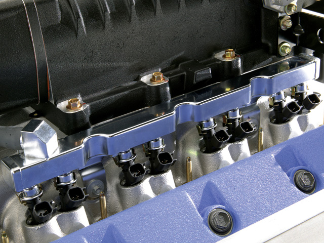 Close-up photo of fuel rail and injectors on an engine