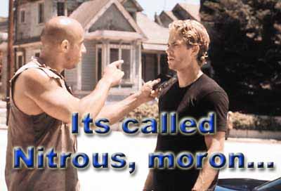 1979 Ford Bronco - Scene from a movie with two men arguing, overlaid with text about nitrous.