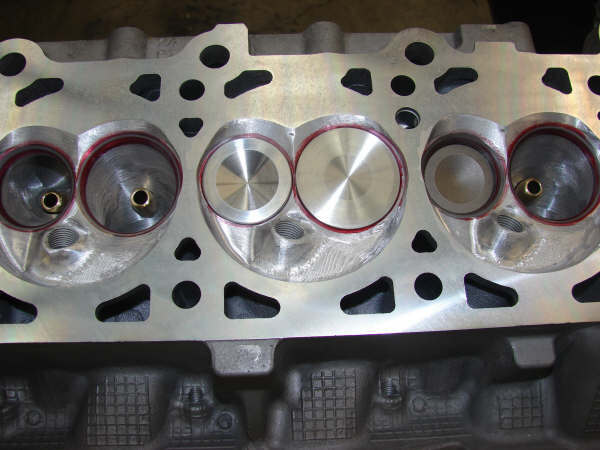 Photo of a machined cylinder head combustion chambers and valve seats