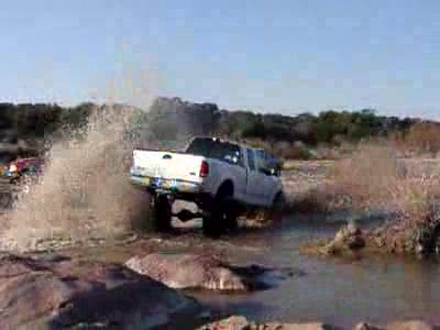 2001 Ford Sport Trac - Mud stuck in the sand and water.