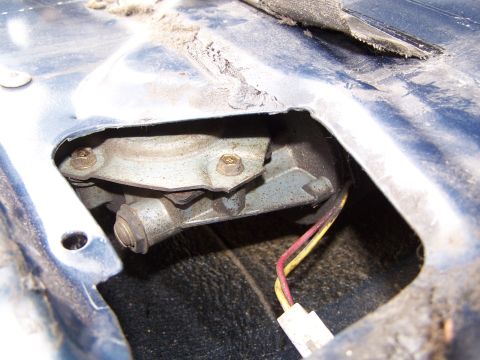 1986 Ford Bronco - This photo shows the internal mechanism of a vehicle's door window regulator, not the exterior of a 1986 Ford Bronco.