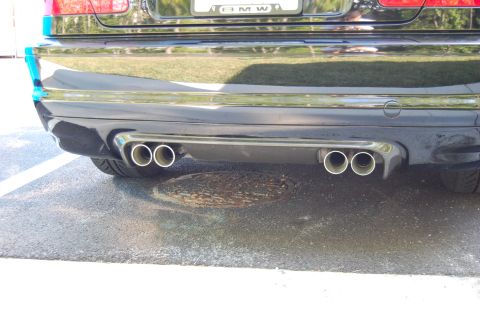 2002 BMW M3 - Rear view of a 2002 BMW M3 showing the CSL diffuser and quad exhaust pipes.