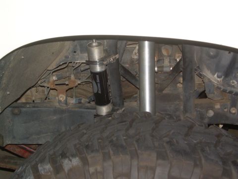 1993 Toyota 4Runner - Close-up view of the rear suspension system, highlighting a "Racing Shock" component.