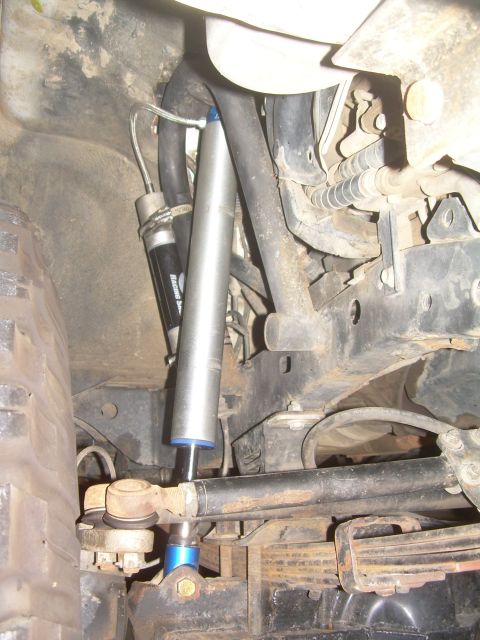 1993 Toyota 4Runner - Close-up view of off-road suspension parts, showing a shock absorber and linkage.