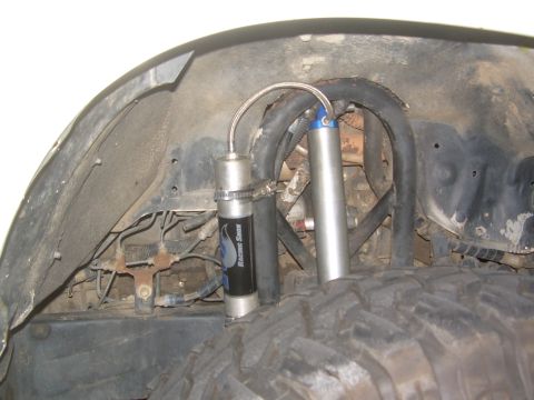 1993 Toyota 4Runner - Off-road suspension components, including shock absorbers and hoses, are visible.