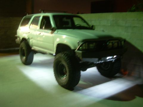 1993 Toyota 4Runner - Modified 1993 Toyota 4Runner on large off-road tires, a custom front bumper.