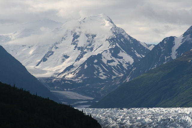 Glacial valley with snow-capped mountains.