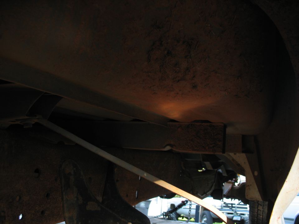 Interior view of a dark vehicle cabin, possibly a van