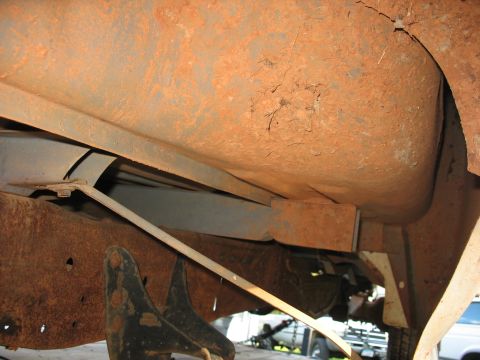 1988 Ford E250 - Close-up of an engine oil dipstick, likely from a Ford E250 van.