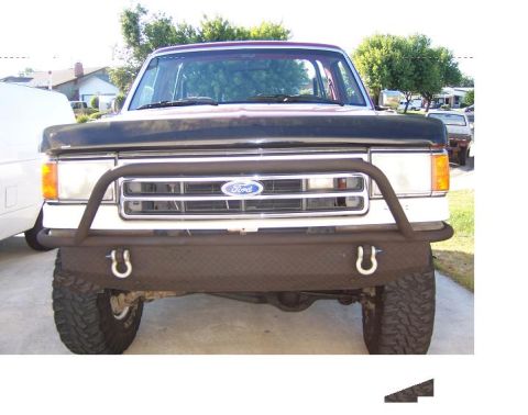 1991 Ford Bronco - Photograph of the front of a Ford truck, not a technical document.