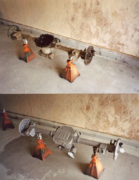 2007 Ford Mustang - Restoration photo collage of a rear axle assembly on jack stands, not a technical document.