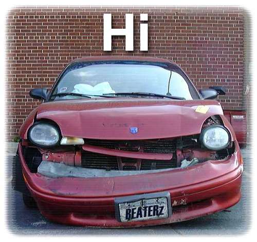 Front of wrecked red Dodge Neon missing bumper cover, BEATERZ plate, word Hi added above
