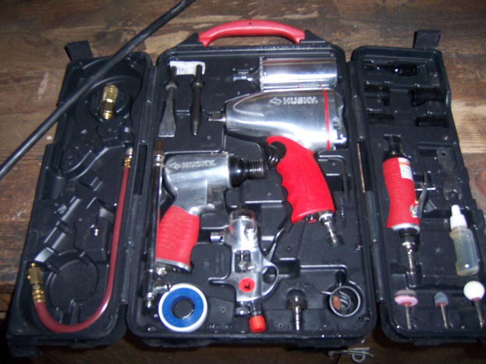 Husky air tool kit with impact wrench, air ratchet, and grinder
