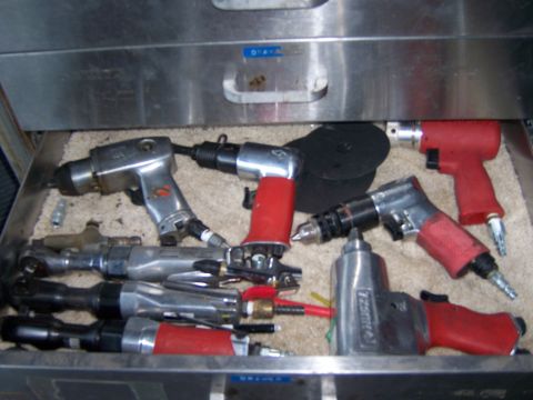 1991 Ford Bronco - Collection of air tools organized in a tool drawer.