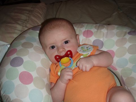 1997 Ford F-250 - Baby with a pacifier on a polka-dot pillow.