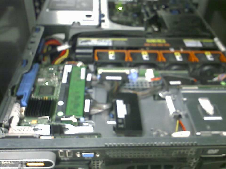 Close-up of vehicle dashboard electronics and wiring