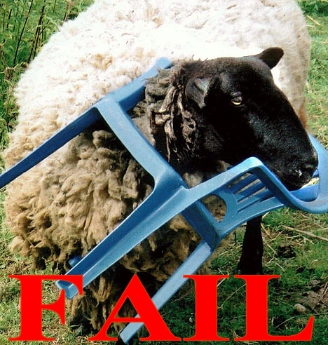 1990 Ford Bronco - A sheep is stuck in a blue plastic chair, with the word 'FAIL' prominently displayed over the image.