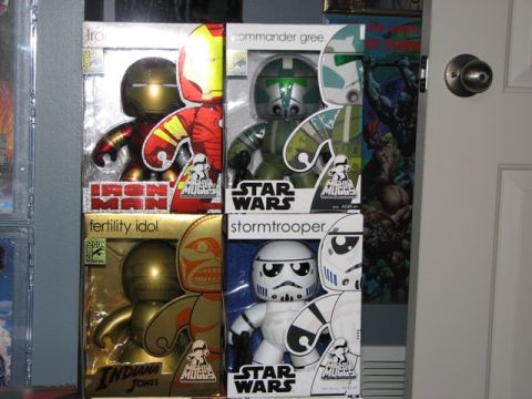 1991 Ford Bronco - Collection of collectible toys, including Star Wars and Marvel characters, displayed in boxes.