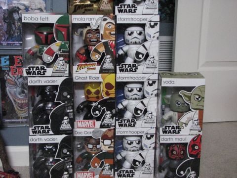 1991 Ford Bronco - A display of various Star Wars and Marvel character action figures packaged for sale.