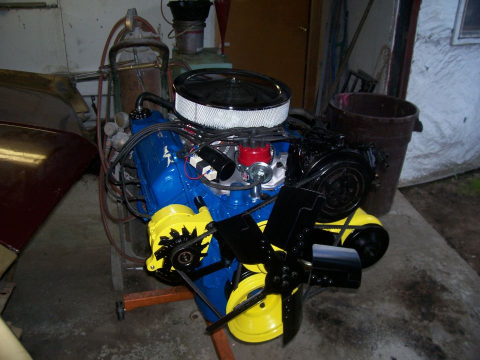 Blue engine with yellow accents and black fan