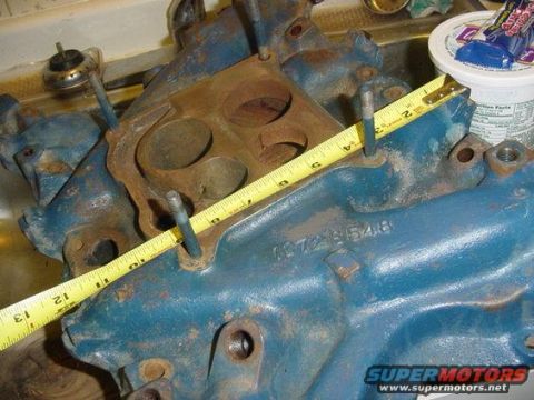 1975 Ford Ranchero - A blue intake manifold is shown with a measuring tape. A part number is visible on the manifold.