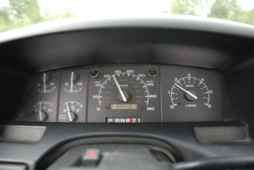 Ford truck instrument cluster showing speedometer, tachometer and gauges