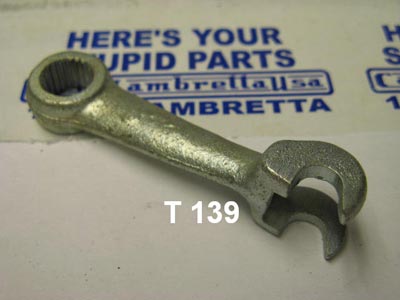 1987 Ford Bronco - A metal part with a splined circular opening on one end and a U-shaped opening on the other is shown against a background with text that re…