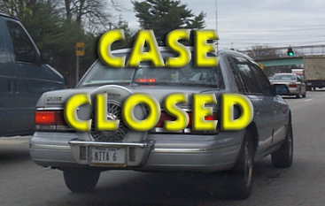2002 Nissan Altima - A silver sedan is seen from the rear, a spare tire mounted on the trunk and a license plate reading NITA 6.