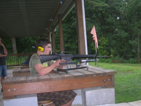 1996 Ford Bronco - Man practices marksmanship at an outdoor shooting range.