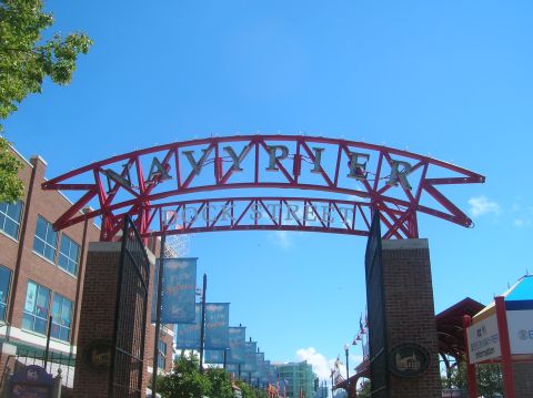 1996 Ford Bronco - Entrance to Navy Pier, a popular tourist attraction with a large red archway and signage.