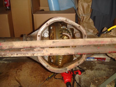1992 Ford Bronco - Close-up view of a vehicle's differential, showing internal gears and rusty exterior components.
