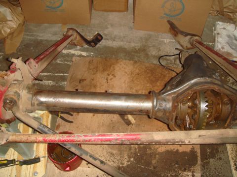 1992 Ford Bronco - Front axle assembly from a Ford Bronco, showing the differential housing and suspension components.