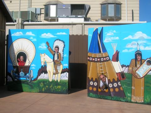 1996 Ford Bronco - Interactive photo cutouts depict scenes from the Old West with people posing for pictures.