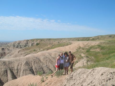 1996 Ford Bronco - A family enjoys a scenic view of badlands terrain on a sunny day.