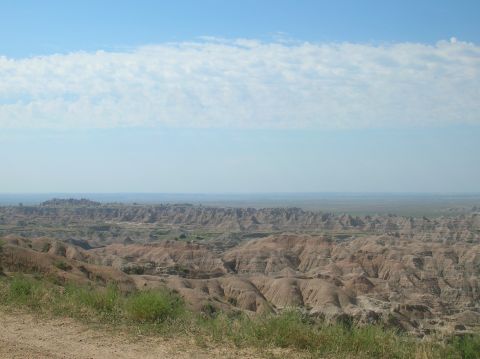 1996 Ford Bronco - Expansive view of the eroded geological formations in Badlands National Park.