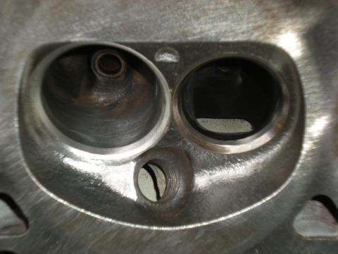 1985 Ford Bronco - This is a close-up view of an engine's cylinder head, showing intake and exhaust ports.