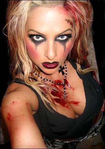 1992 Ford Bronco - A woman poses with dramatic makeup and fake blood, possibly for a costume.