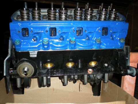1985 Ford Bronco - Engine block and cylinder head assembly with visible valves and springs.