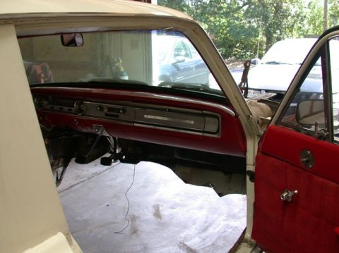 1964 Ford Ranchero - Interior view of a 1964 Ford Ranchero, highlighting the dashboard and door panel details.