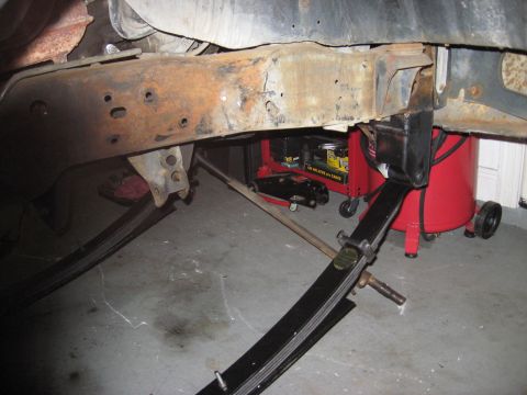 1991 Ford Bronco - Vehicle frame and suspension components, possibly undergoing repair or modification.