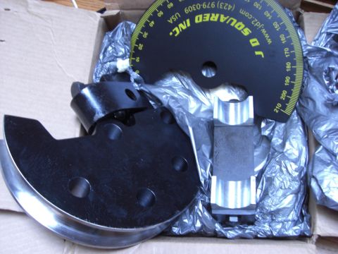1993 Ford Bronco - A set of pipe bender dies and a protractor are shown inside a box.