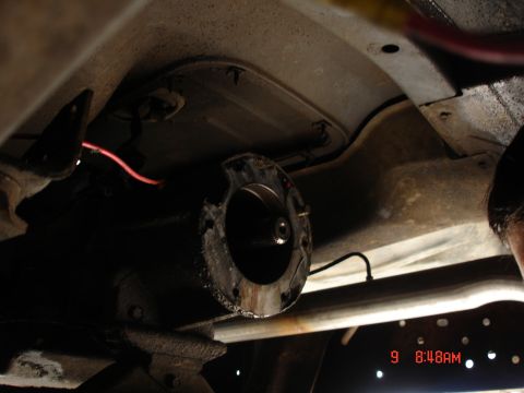 1979 Ford Bronco - Transmission and exhaust components visible from underneath a vehicle. Supermotors.net logo present.