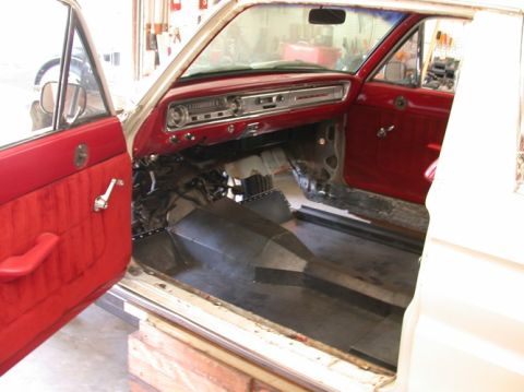 1964 Ford Ranchero - Interior view of a 1964 Ford Ranchero during restoration, with custom metal floor panels fitted.