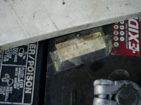 1979 Ford F-150 - A handwritten label on a car battery indicates it was purchased on 10-28-01.