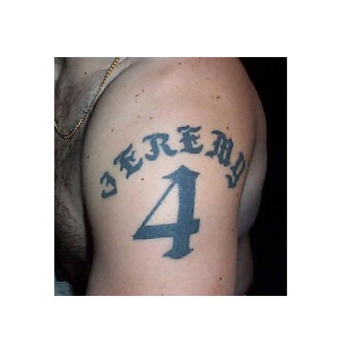 1992 Ford Bronco - A tattoo on an arm displays the name JEREMY above the number 4.