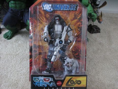 1991 Ford Bronco - This action figure packaging features Lobo and his bulldog, Dawg. It is part of the DC Universe Classics line.