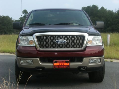 2005 Ford F-150 - Front view of a maroon Ford F-150 truck, likely a 2004 model, with a Harlem Fire Department plate.