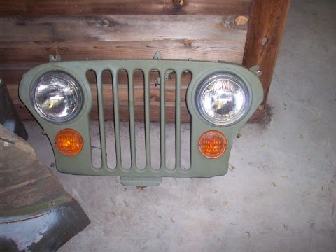 1978 Jeep CJ5 - Front grille assembly for a 1978 Jeep CJ5, the iconic vertical slots and dual round headlights.