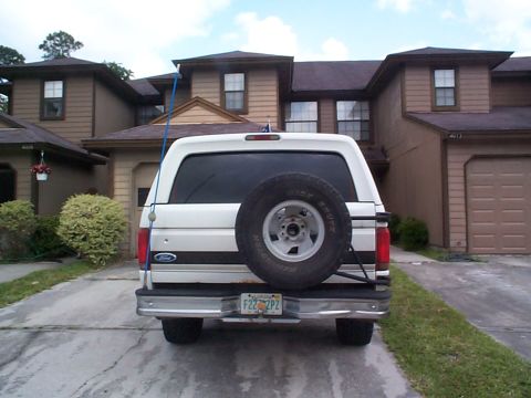 1992 Ford Bronco - This 1992 Ford Bronco is parked in front of a residential building.