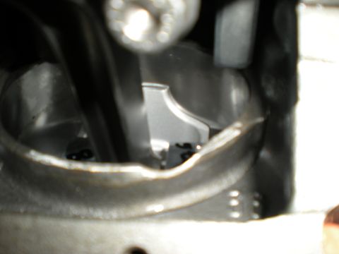 1985 Ford Bronco - A detailed view of an internal engine part, showing mechanical components.